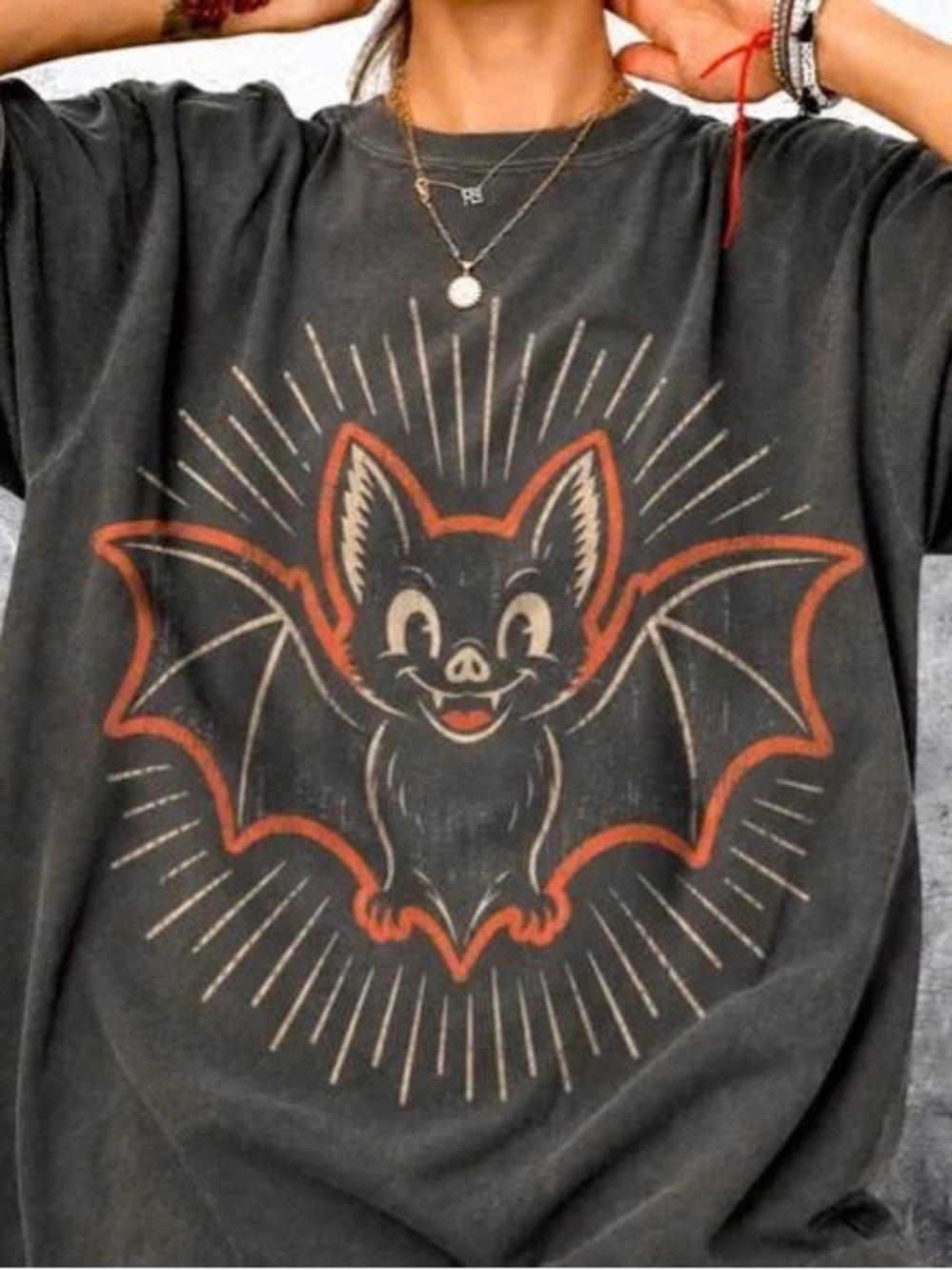 Black Short Sleeve Tee with Orange-Outlined Bat Graphic